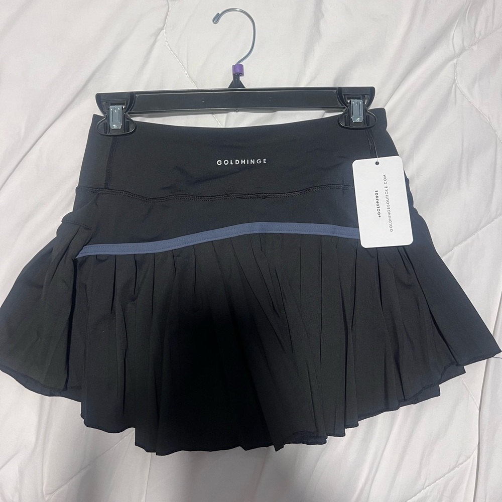 Gold hinge black mini skirt
